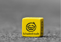 A Die With Smiley Faces